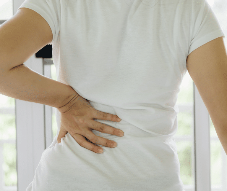 sudden loss of bladder control and back pain